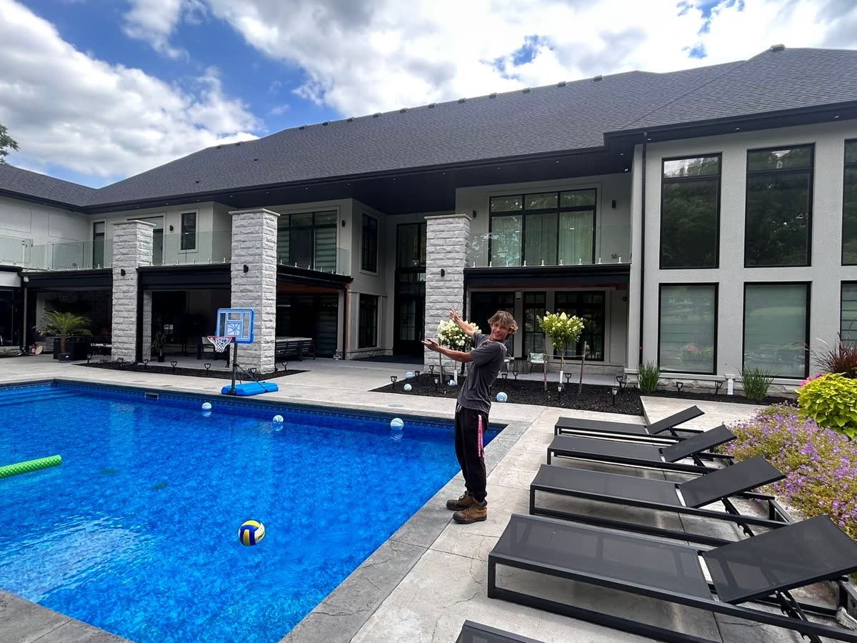 Time 2 Clean on the job at a modern home with floor-to-ceiling windows in Southwestern Ontario